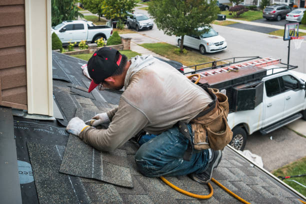 Professional Roofing technician working in Livermore, ME